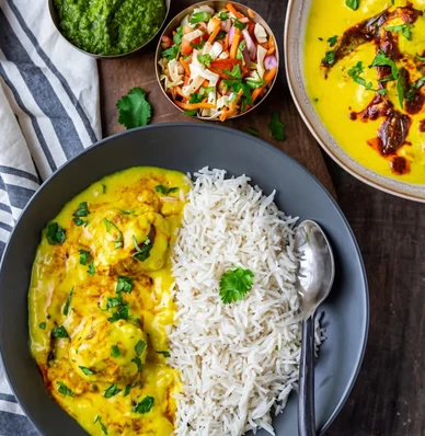 Kadhi rice bowl, yogurt and gram flour curry over rice, at Pind Di Roti in Toronto